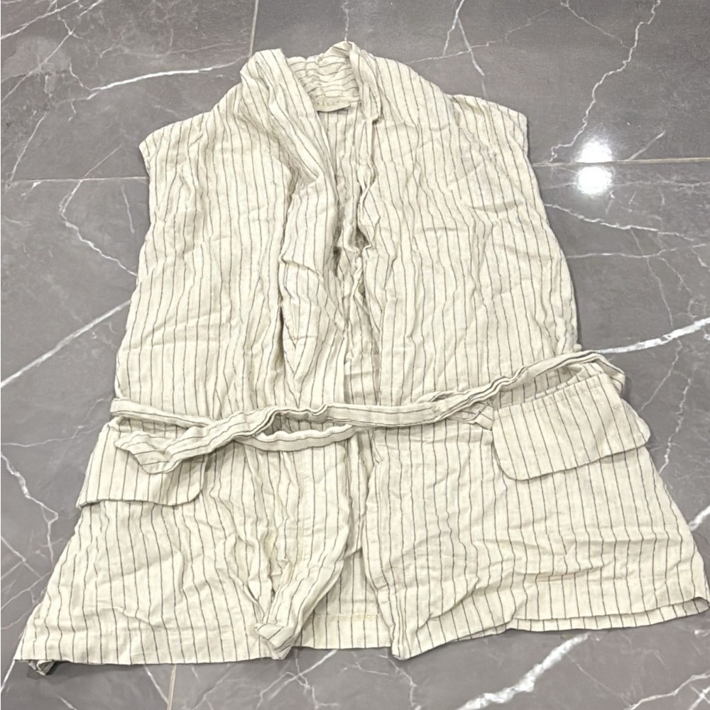 Stripped vest with a belt